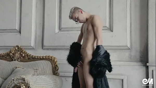 Show Blond twink boy nude in fur coat shows his long uncut cock power Tube