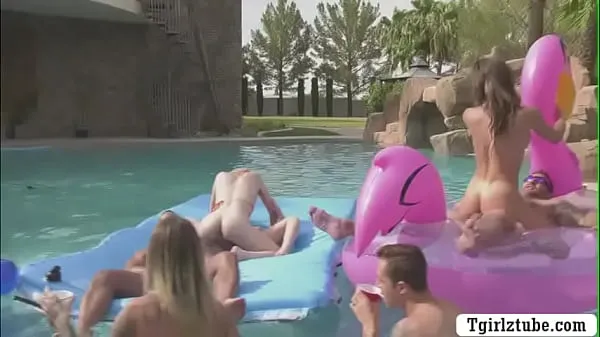 Show Busty shemales are in the swimming pool with many guys that,they decide to do orgy and they start kissing each is,they suck their big cocks passionately and they let them bareback their wet ass too power Tube