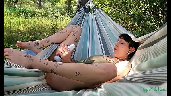 Prikaži HappY satisfying herself in the hammock. Outdoors in nature. The stain, Spain Power Tube