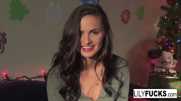 Show Lily tells us her horny Christmas wishes before satisfying herself in both holes power Tube